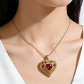 Gold-Tone Filigree Heart Pendant Necklace with Red Stones